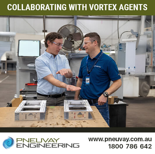 Andreas (Germany) and Balazs (Hungary) observing the assembly of valves along the bench